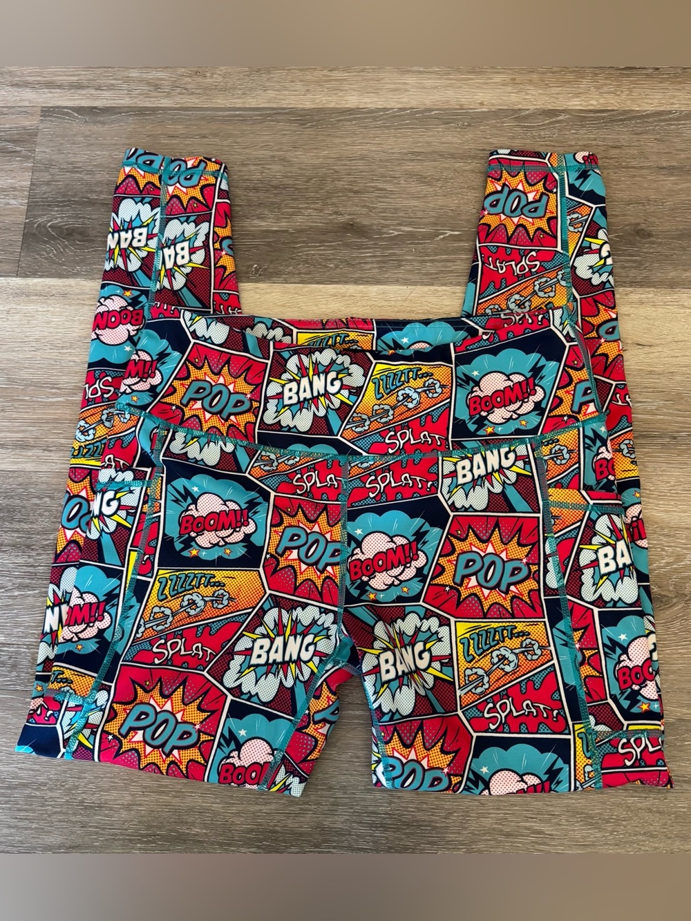 CVG Constantly Varied Gear Knockout Comic Strip Print Full length Leggings Sz L